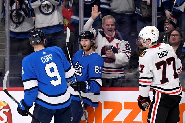 Hockey News Andrew Copp Scores Go ahead Goal Jets Come Back To Beat Blackhawks
