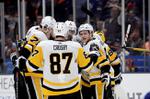Bailey lifts Islanders past Penguins 4-3 in OT in Game 1