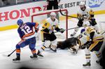 Bailey lifts Islanders past Penguins 4-3 in OT in Game 1